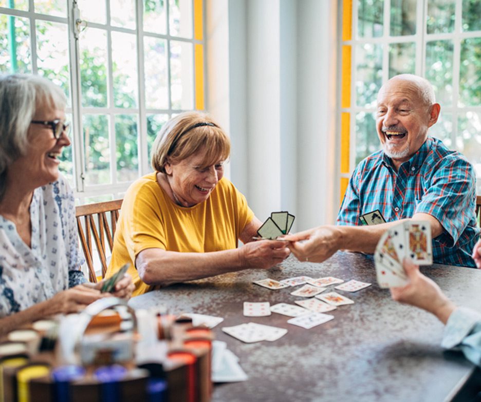 Elderly-individuals-playing-cards-at-assisted-living-in-Ventura-County