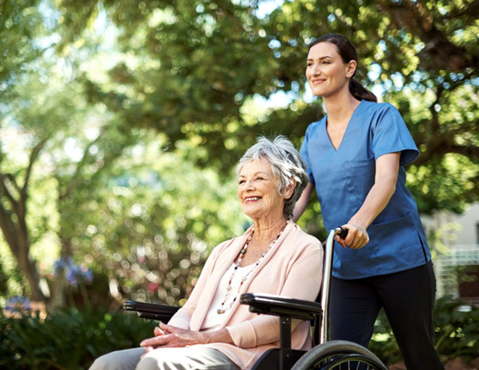 Elderly-woman-enjoying-time-outdoors-at-a-nursing-home-in-Ventura-County