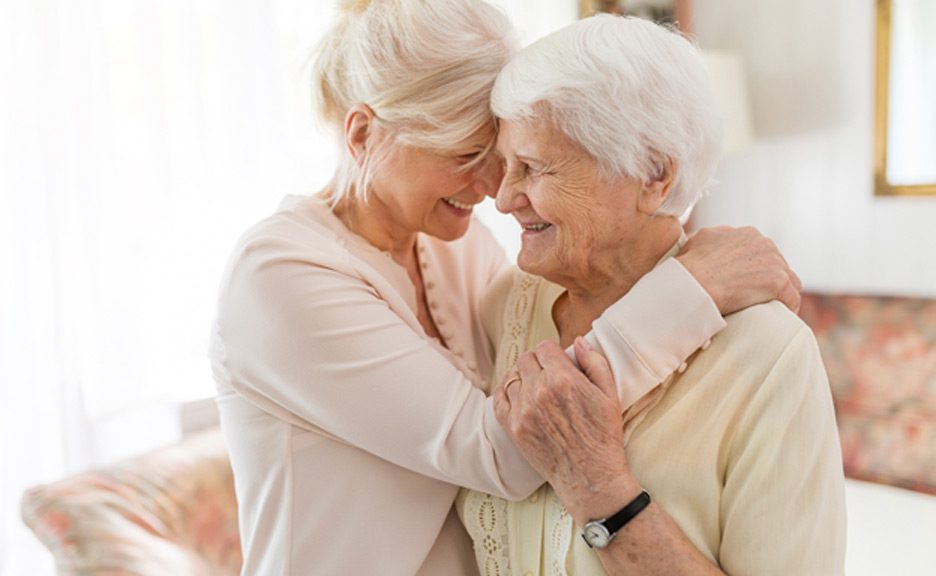 Senior-woman-hugging-daughter-and-needing-care-from-nursing-home-in-The-Valley