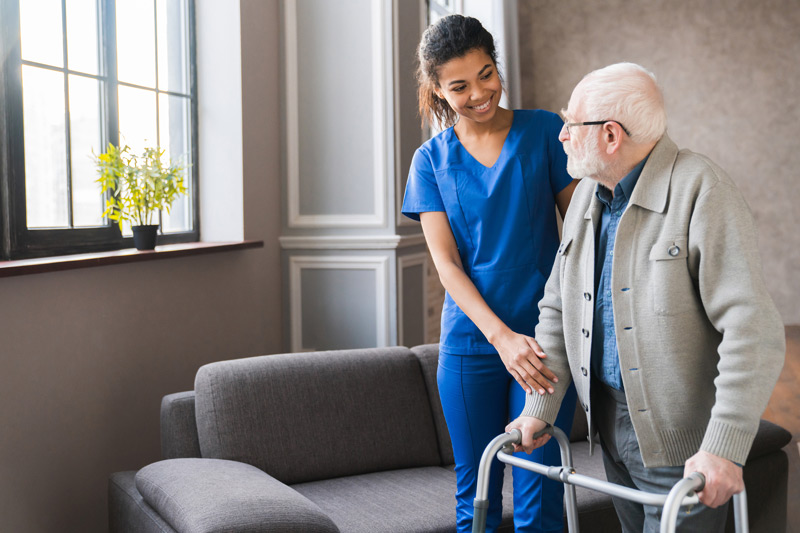 Female-nurse-assisting-elderly-resident-at-assisted-living-in-The-Valley Female-nurse-assisting-elderly-resident-at-assisted-living-in-The-Valley