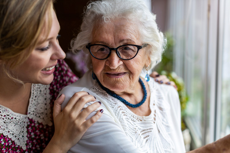 Woman-visiting-grandmother-in-nursing-home-in-Simi-Valley Woman-visiting-grandmother-in-nursing-home-in-Simi-Valley